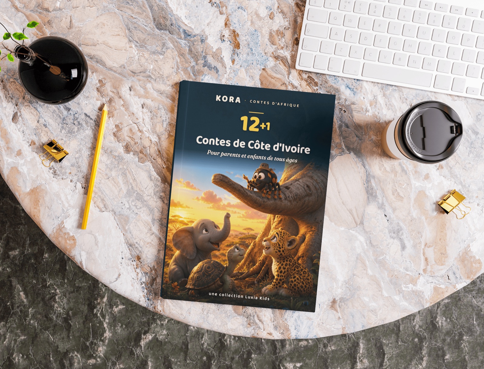 Le livre Kora posé sur un plan de travail